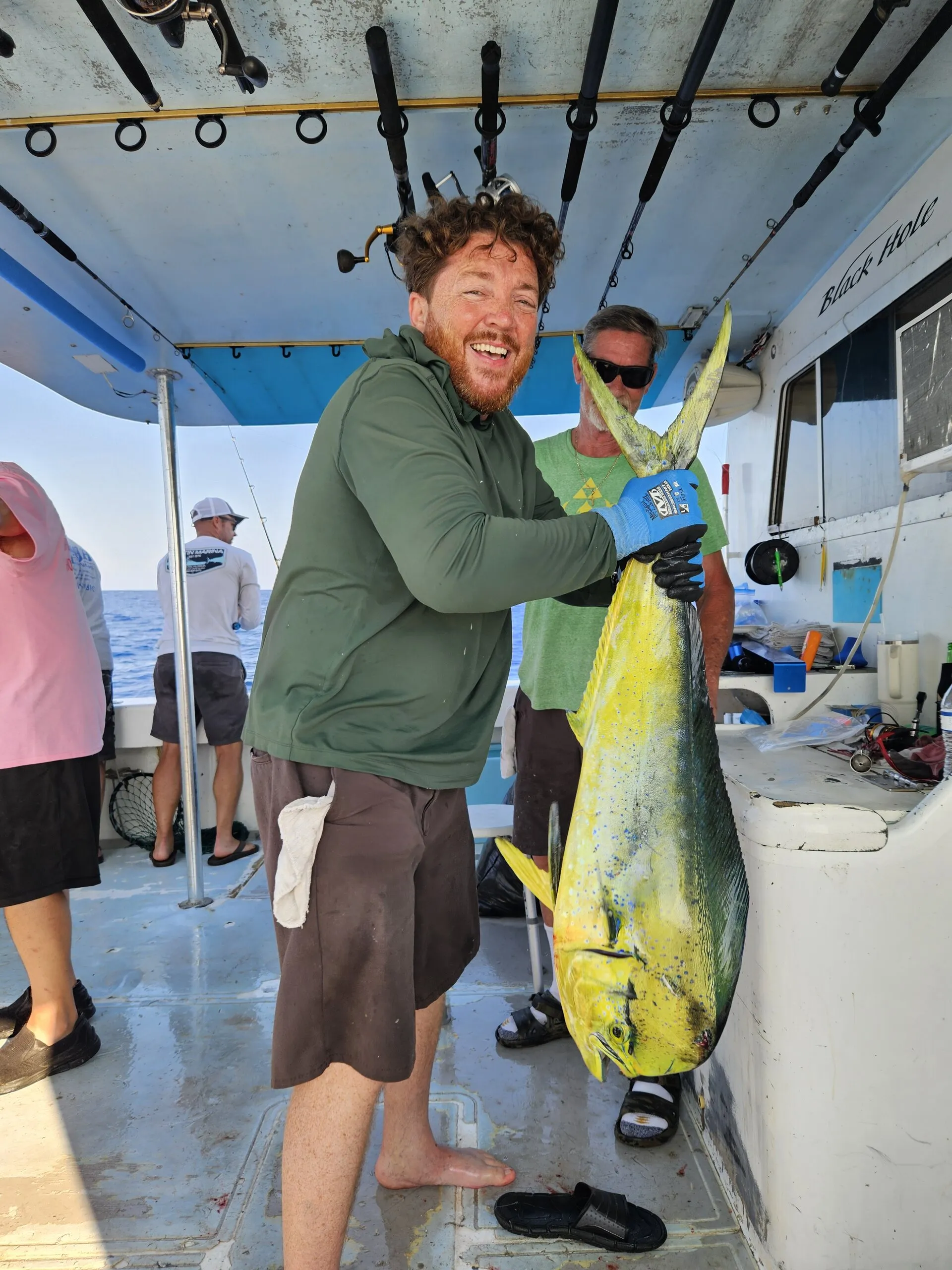 Angler with a mahi