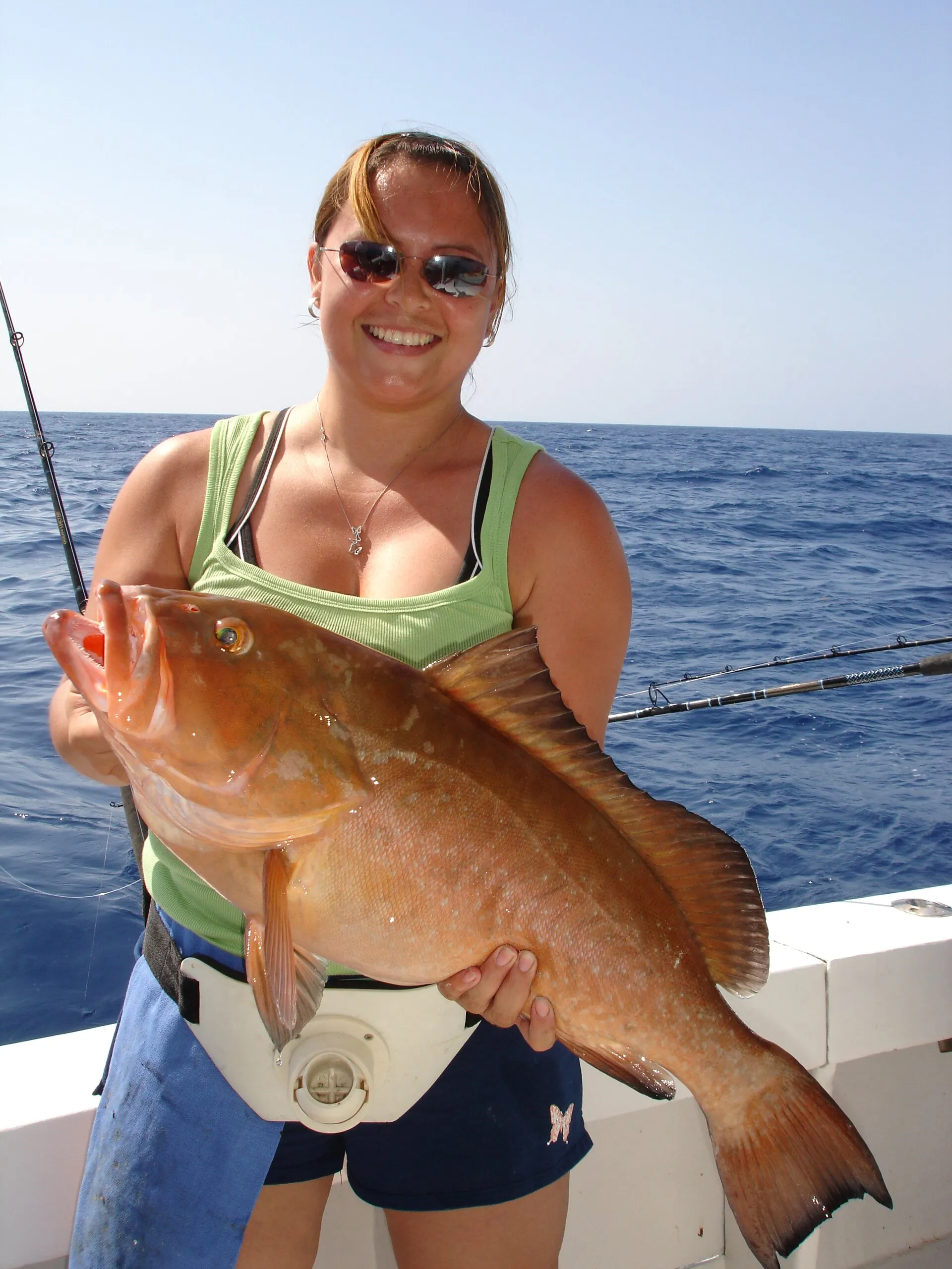 Angler with a red grouper