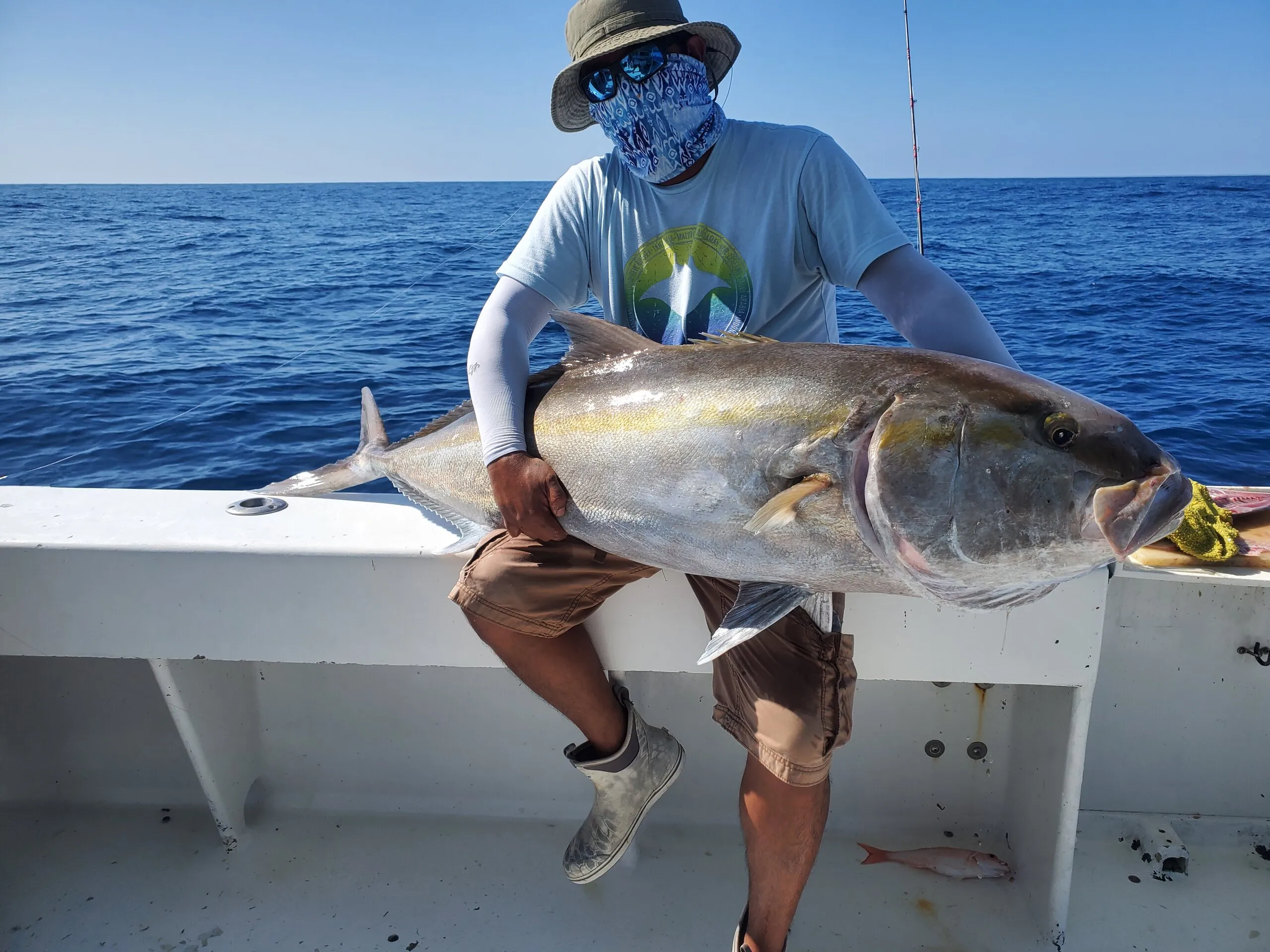 Angler with an amberjack