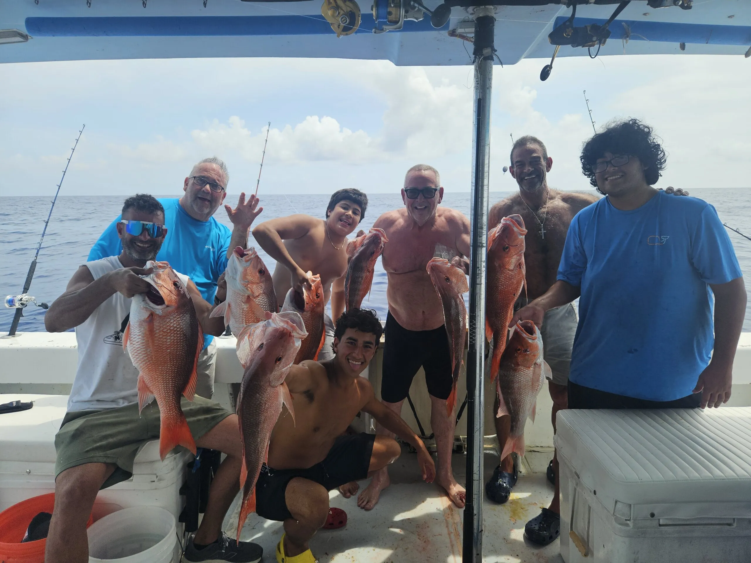 Group with snapper on deck