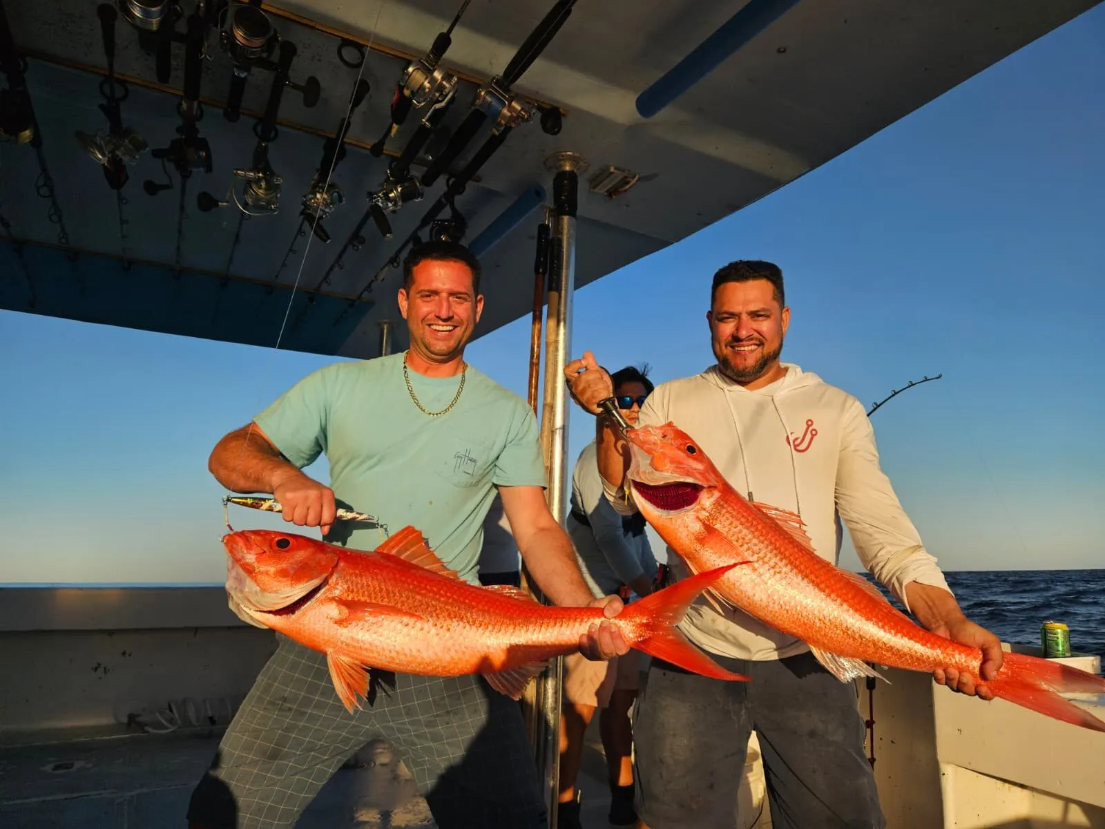 Two anglers with queen snapper